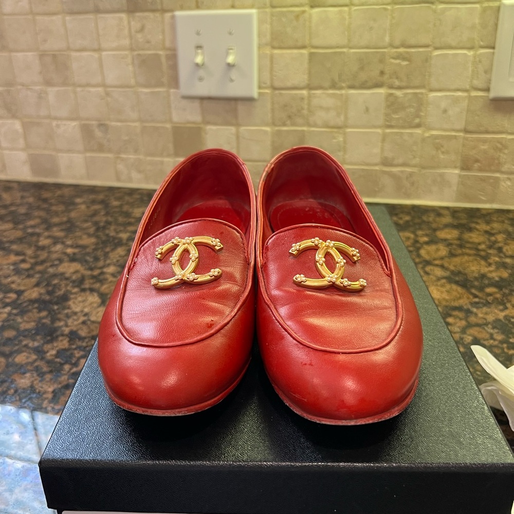 CHANEL Red Loafers with Gold Emblem